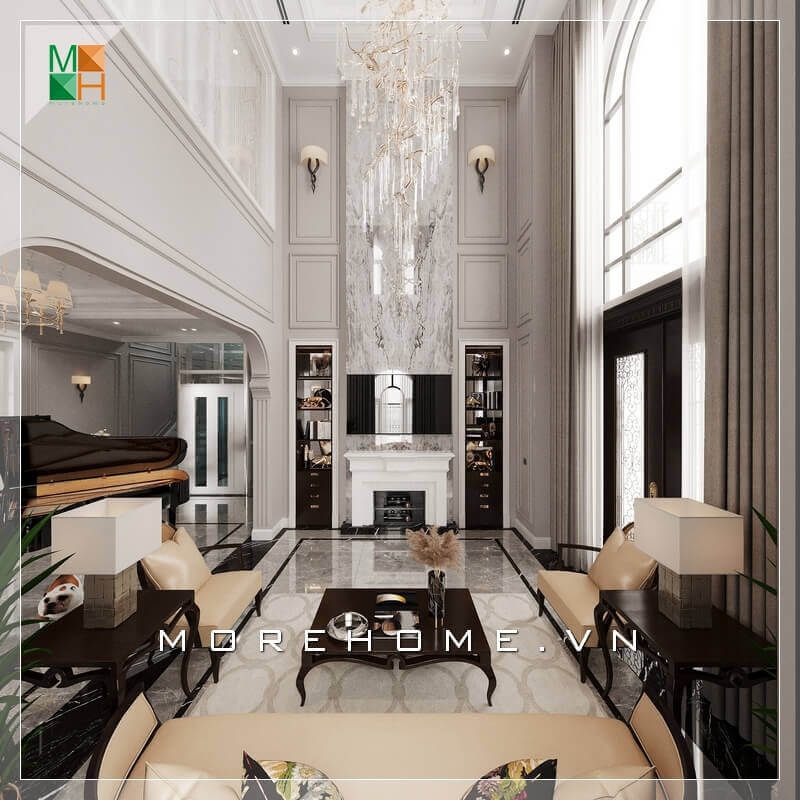 Không gian phòng khách của chúng ta trông rất sang trọng và đẳng cấp với bàn ghế sofa sử dụng chất liệu bàn là gỗ tự nhiên cao cấp và ghế sofa bọc da chân ghế. Tất cả đều tạo nên một không gian phòng khách tráng lệ.